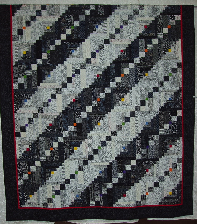    Ribbon Winner 10 E 01 Isabel Downs - Nothing is All Black and White - 3rd Place Large Traditional Pieced Commercially Quilted